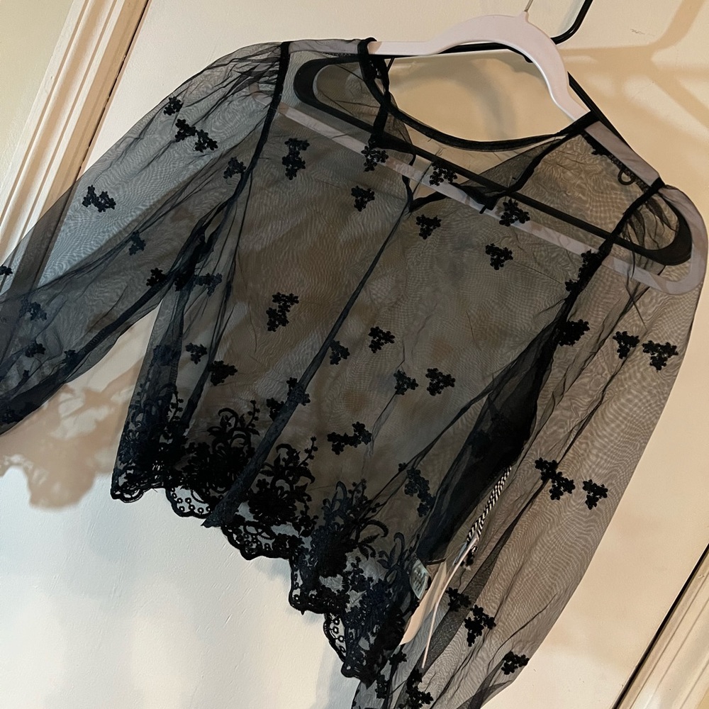 Black Lacey top. Very pretty with any outfit.